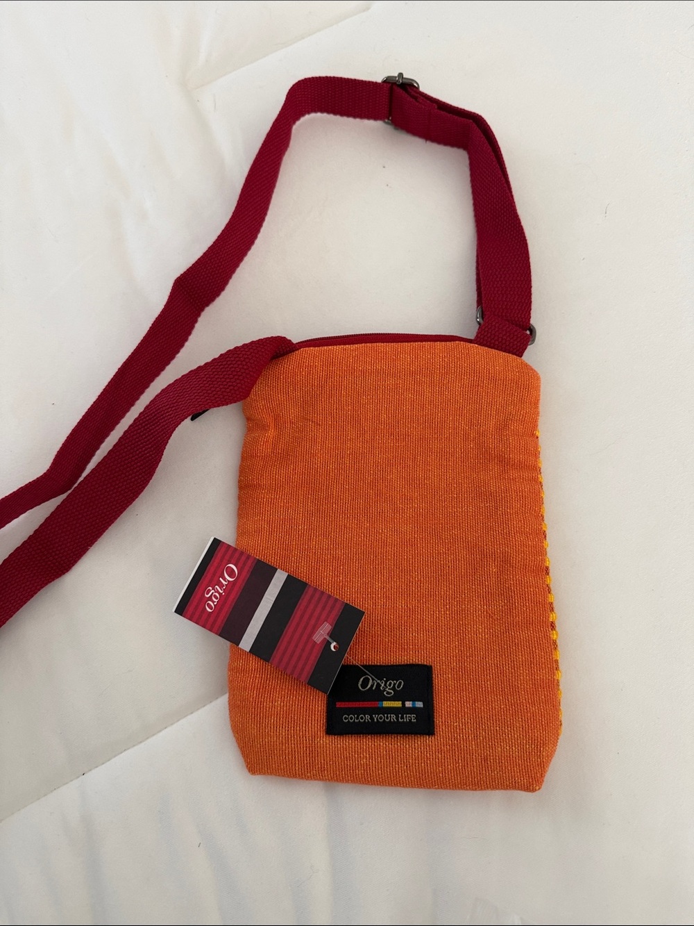 Origo Bright Orange Crossbody Bag with Colorful Logo Tag